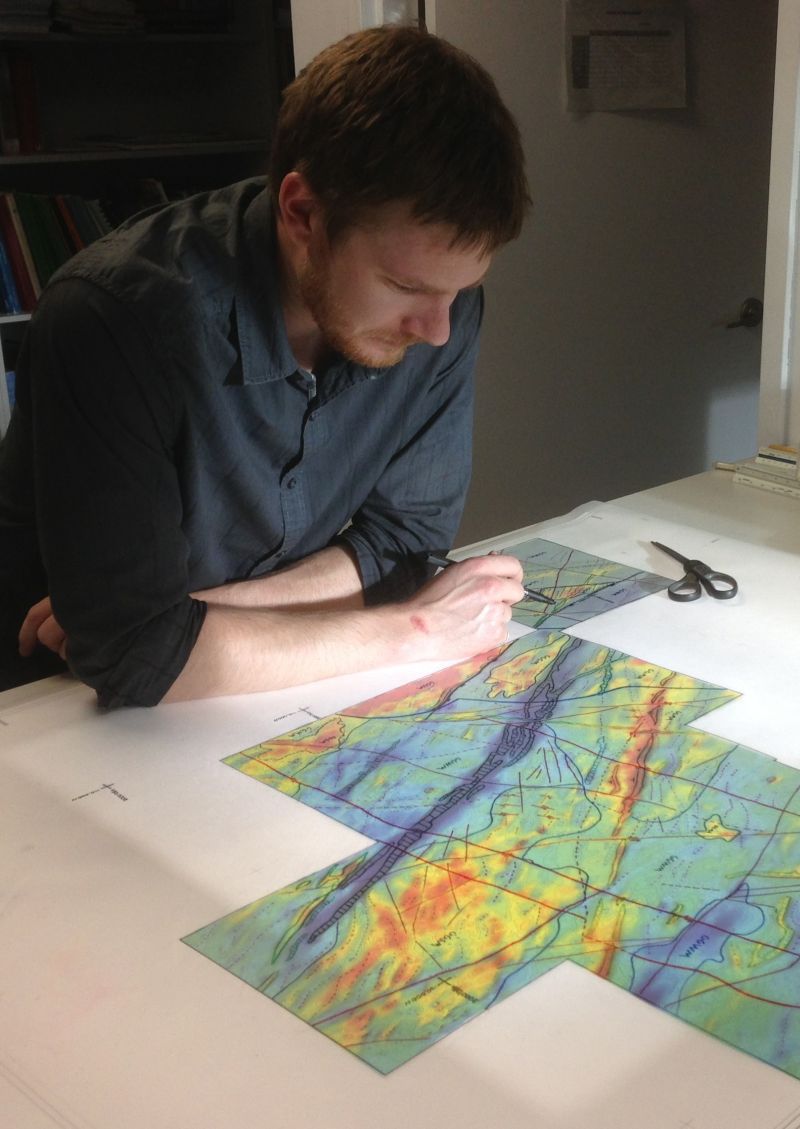 Dave Toni interpreting aeromagnetic data